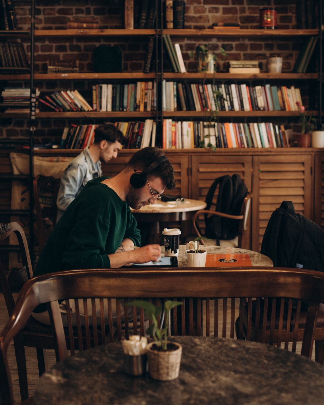 Travel Journalist at work in rustic café